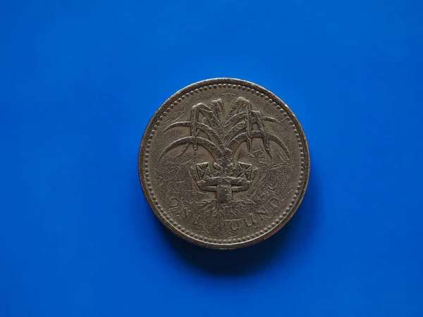 Μία Λίρα Gbp Νόμισμα Νόμισμα Του Ηνωμένου Βασιλείου Μπλε Φόντο — Φωτογραφία Αρχείου