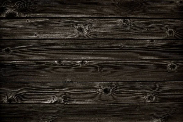 ダークブラックの素朴な板で木の背景 — ストック写真