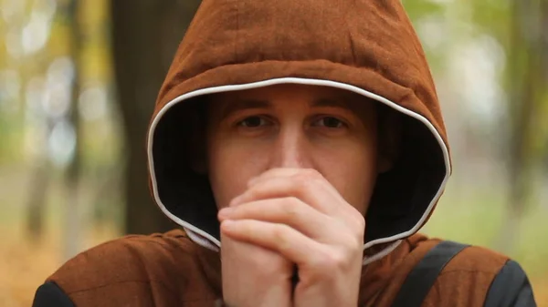 Young Man Warming His Hands Outdoors — Stock Photo, Image