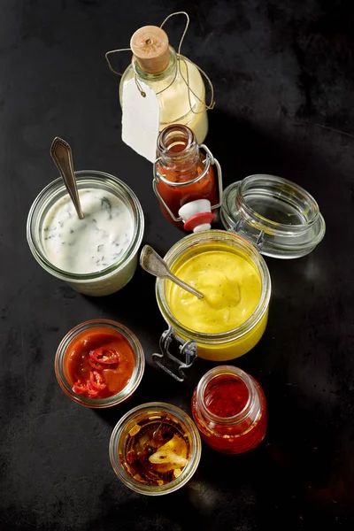 Jars Hot Sweet Sour Sauces Toppings Dark Background Concept Sandwich — Stock Photo, Image