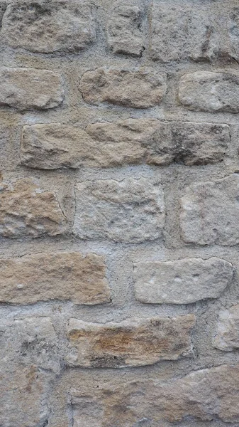 Kahverengi Taş Duvar Arka Plan Olarak Kullanışlı Dikey — Stok fotoğraf
