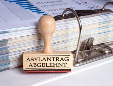 asylum application rejected stamp in the office clipart