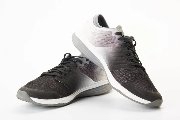 Nieuwe Moderne Sportschoenen Sneakers Trainer Witte Achtergrond — Stockfoto
