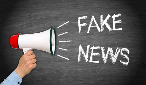 Fake News Megafon Ręką — Zdjęcie stockowe