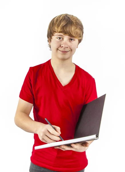 Knappe Jongen Met Rode Shirts Schrijft Zijn Boek — Stockfoto