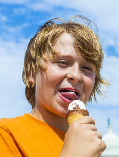Young Boy Eating Tasty Ice Cream Capitol Background Stock Picture