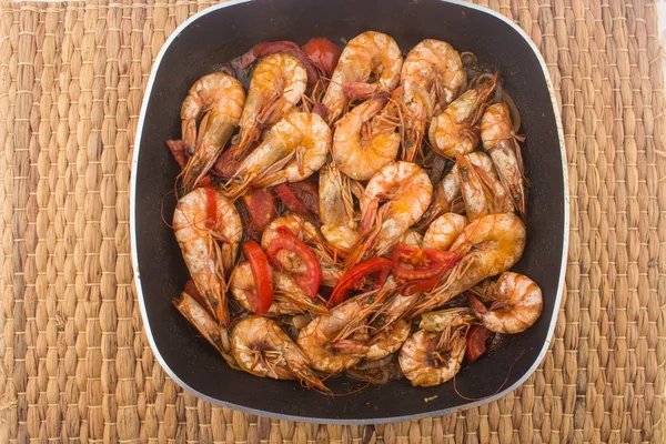 Cooked Fresh Shrimp with Tomato and Onions / Cooked Fresh Shrimp with Tomato and Onions Served in a plate on a Wooden ( Black Ceramic) background