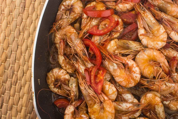 Cooked Fresh Shrimp with Tomato and Onions / Cooked Fresh Shrimp with Tomato and Onions Served in a plate on a Wooden ( Black Ceramic) background