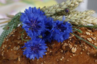 baked goods decorated with cornflowers and cereals clipart