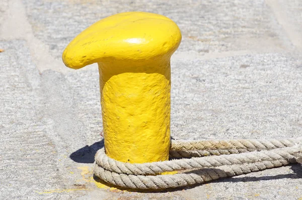 mooring dock with nautical ropes chains