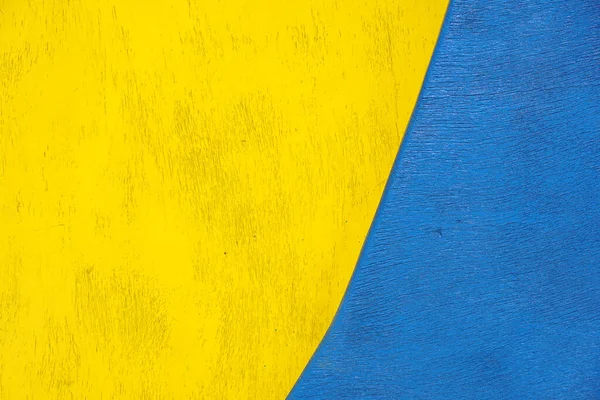 Χρωματισμένος Ξύλινος Τοίχος Από Μπλε Και Κίτρινο — Φωτογραφία Αρχείου