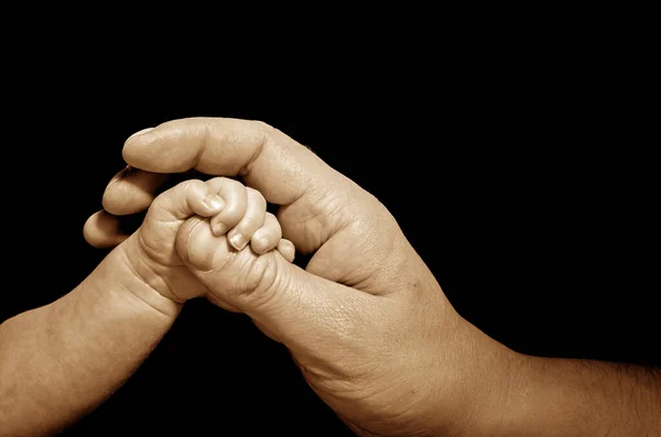 Newborn Trusts Adult Hand — Stock Photo, Image