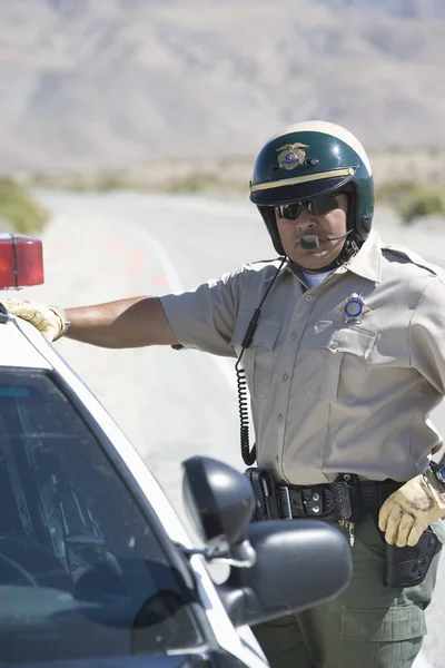 Mature Police Officer Standing His Car Stock Image