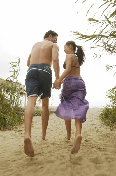 Rear View Cheerful Couple Running Together While Holding Hands Beach — Stock Photo, Image