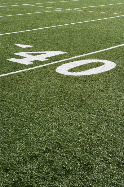 人工芝とアメリカン フットボールのフィールドの ヤード ライン — ストック写真