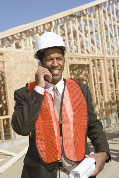 Male Architect Call Blueprint Front Framework Construction Site Royalty Free Stock Images