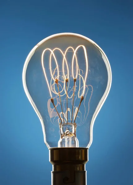 Transparente Glühbirne Auf Blauem Hintergrund — Stockfoto