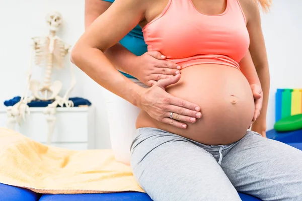 Pregnant Woman Physical Therapist Sitting Couch — Stock Photo, Image