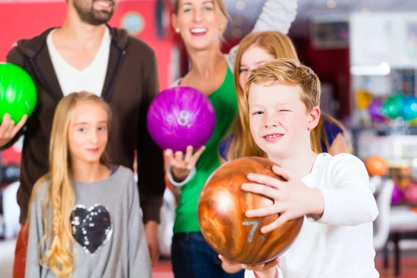 Parents Playing Children Together Bowling Center Royalty Free Stock Photos