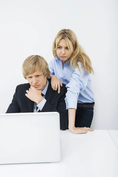 Businesspeople Using Laptop Desk Office Stock Picture