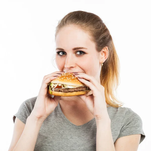 Retrato Uma Jovem Bonita Comendo Hambúrguer Isolado Branco — Fotografia de Stock