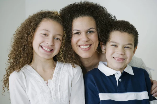 Mixed race family smiling