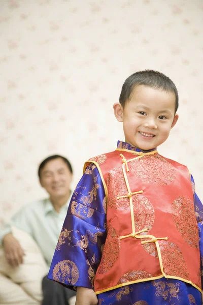 Chinese boy smiling at the daytime
