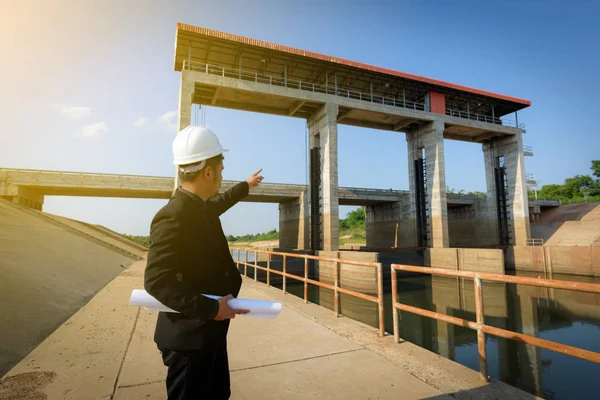 Asian Young Man Engineers Holding Blueprint Point Fingers Floodgates Check — Stock Photo, Image