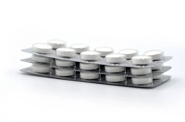 Tabletta Fehér Alapon Izolált Csomagolásban — Stock Fotó
