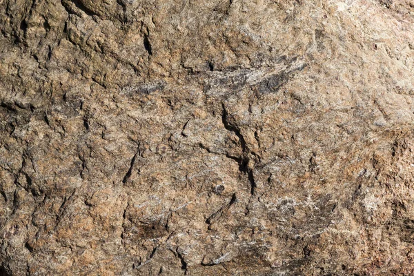 古い石には多くの凹凸や異種構造があります 石畳の表面の写真のクローズアップ — ストック写真