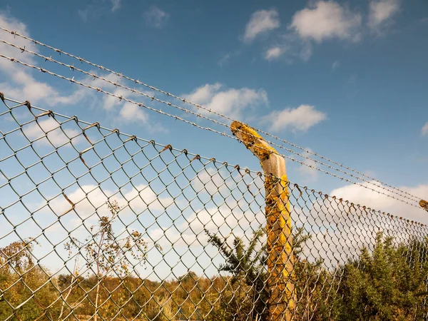 Metal Fence Barbed Fire Protecting Closed Private — Stock Photo, Image