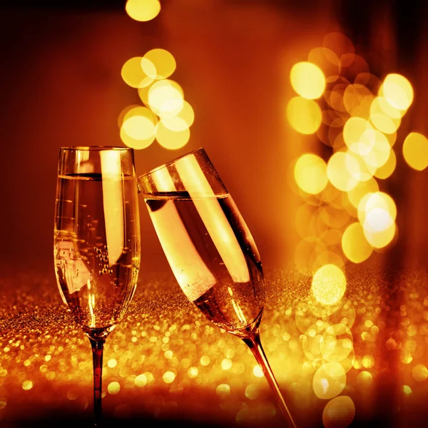 Abstract Goud Gloeiende Bokeh Achtergrond Met Champagne Voor Nieuwjaar Gefeliciteerd — Stockfoto