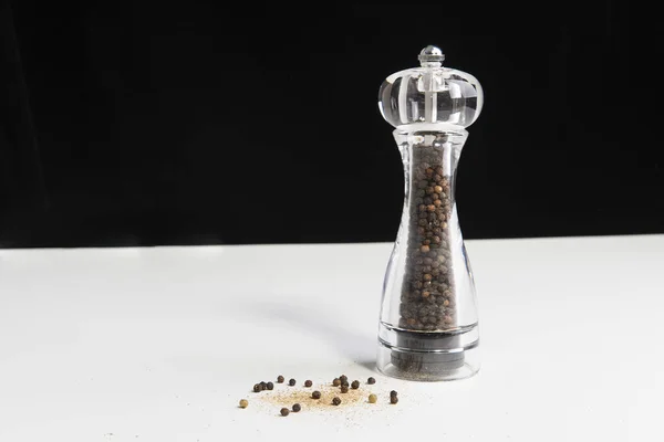 Pepper Mill White Surface — Stock Photo, Image