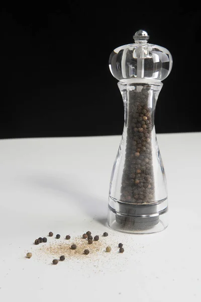 Pepper Mill White Surface — Stock Photo, Image