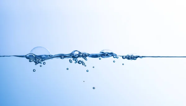 Salpicadura Agua Sobre Fondo Azul —  Fotos de Stock