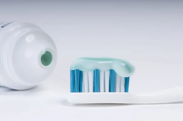 Toothbrush Toothpaste Tube White Surface — Stock Photo, Image