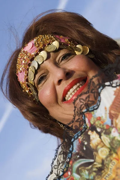 Low angle view of a mature woman smiling