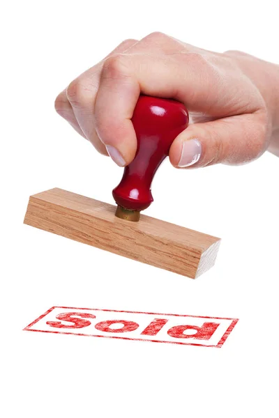 Hand Holding Rubber Stamp Word Sold — Stock Photo, Image