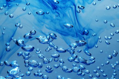 water drops on a blue background clipart