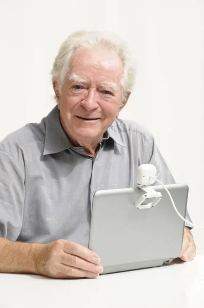 Elderly Gentleman Netbook Webcam — Stock Photo, Image