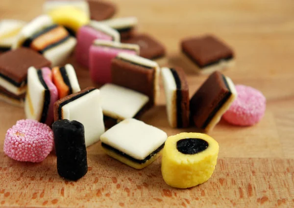 Assorted Chocolate Candies Wooden Table — Stock Photo, Image