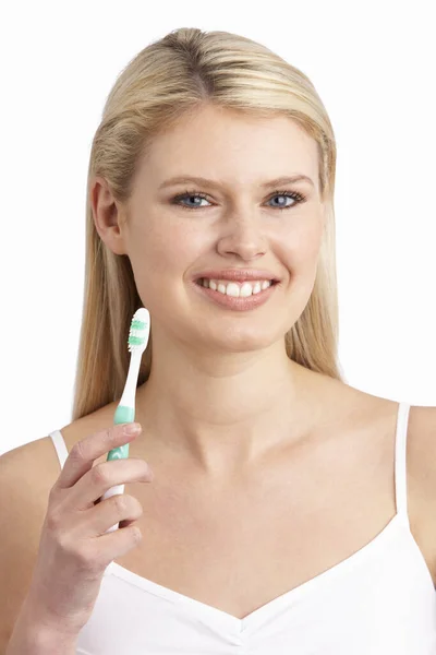 Young Woman Brushing Teeth Studio — Stock Photo, Image