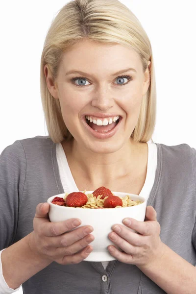 Jonge Vrouw Eten Kom Voor Gezond Ontbijt Cereal Studio — Stockfoto