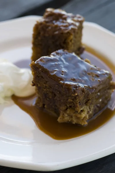 Sticky Pudding Cream Silver Spoon Wooden Table — Stock Photo, Image