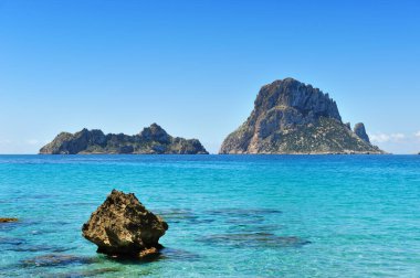The islands and turquoise waters Es Vedra Cala d' clipart