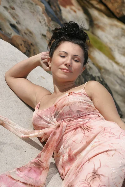 Beautiful Fashion Woman Pink Dress Lying Outdoors Royalty Free Stock Images