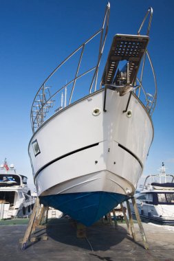 sailboat dry docked for repairs,mallorca,balearic islands,spain clipart