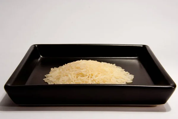 Rice Black Plate — Stock Photo, Image