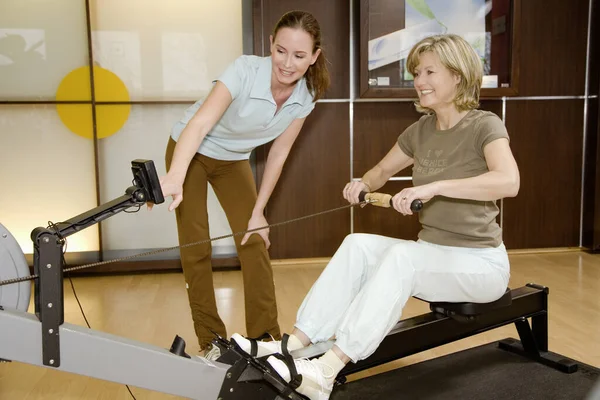 Woman Fitness Club Trainer Doing Exercise Stock Picture