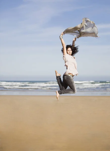 Beautiful Happy Young Girl Running Jumping Windy Beach Blowing Scarf — Stock Photo, Image
